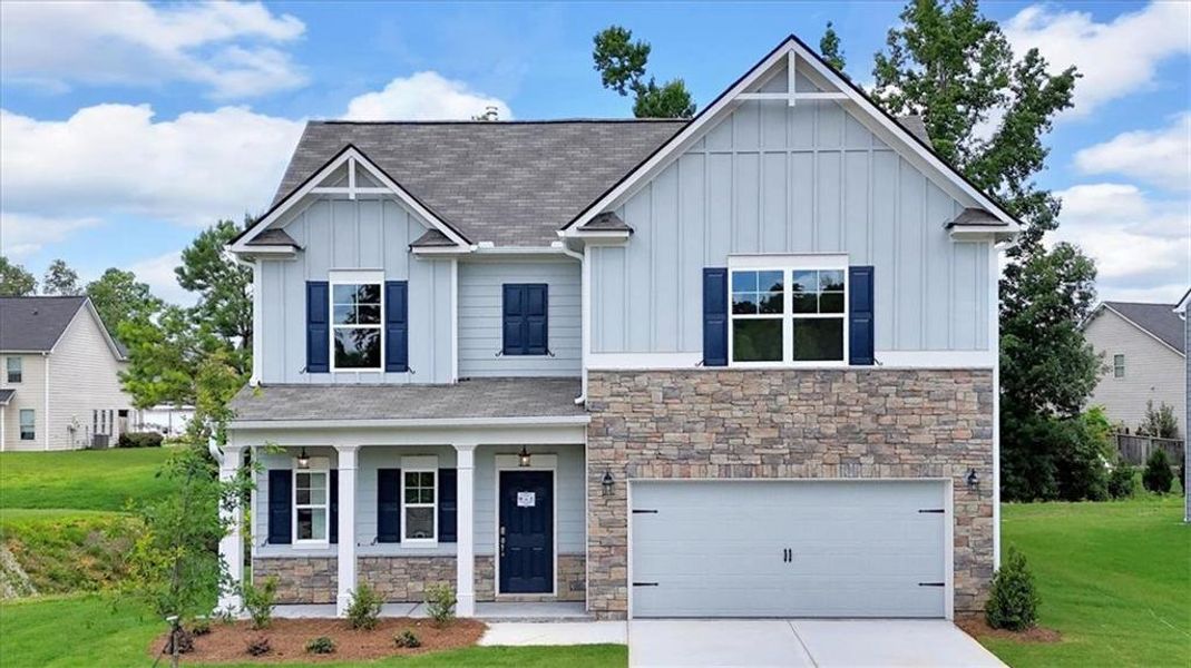 Front exterior of a new home in Sweetlake Grove, Mableton, GA, highlighting curb appeal (Image 1).