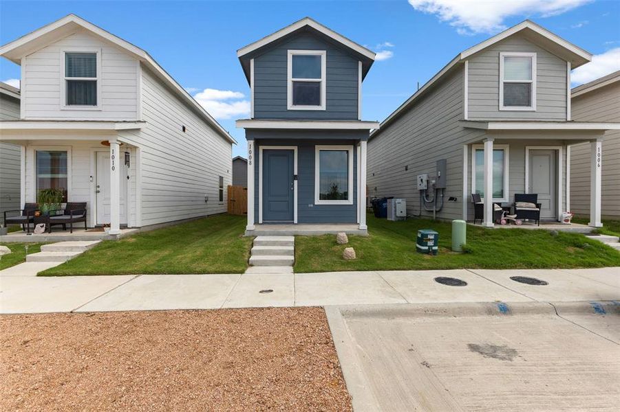 Front exterior of a new home in Tillage Farms, Princeton, TX, highlighting curb appeal (Image 1). Front exterior of a new home in Tillage Farms, Princeton, TX, highlighting curb appeal (Image 1).