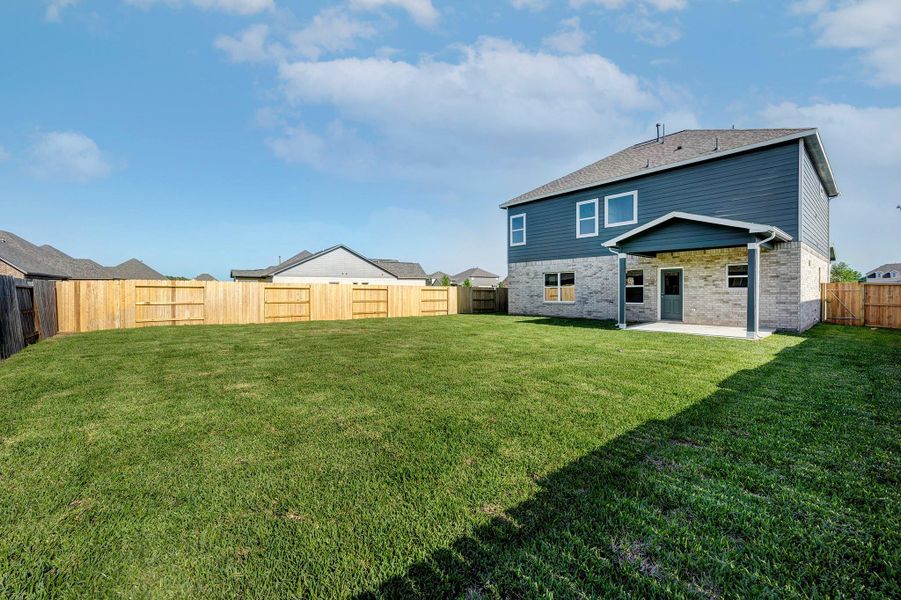 Rear yard of the home. Rear yard of the home.