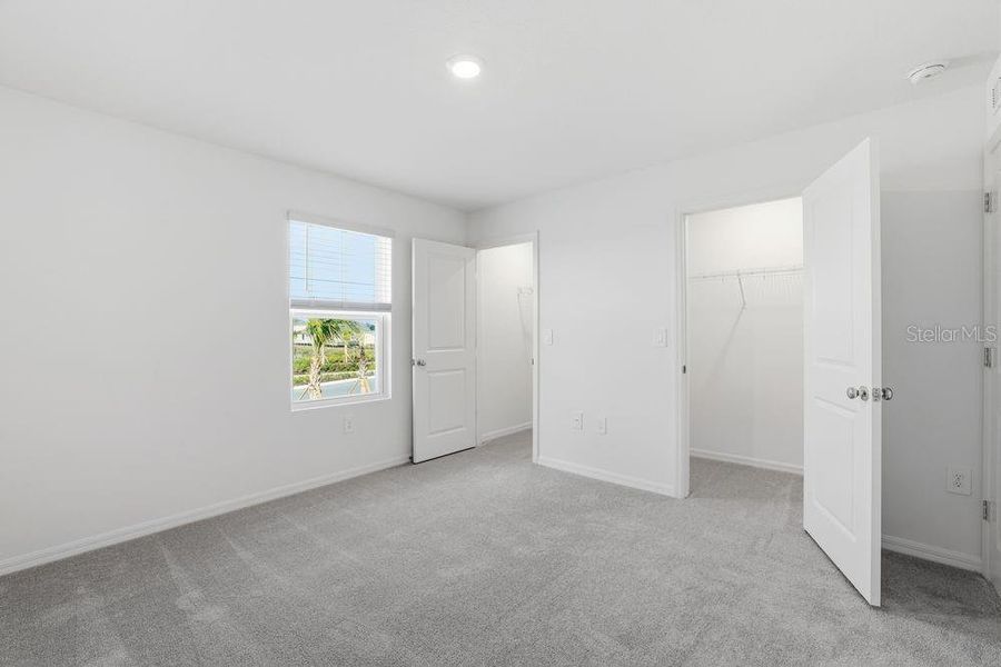 Spacious, unfurnished interior of a new home in The Towns at Firethorn, Parrish (Image 20).