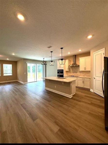 Furnished interior view inside a new home in Legends Preserve - Signature Series, Daytona Beach (Image 3).