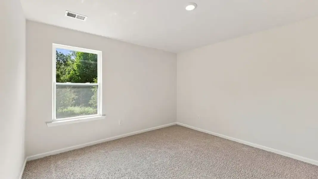 Spacious, unfurnished interior of a new home in Rocky River Ridge, Anderson (Image 23).