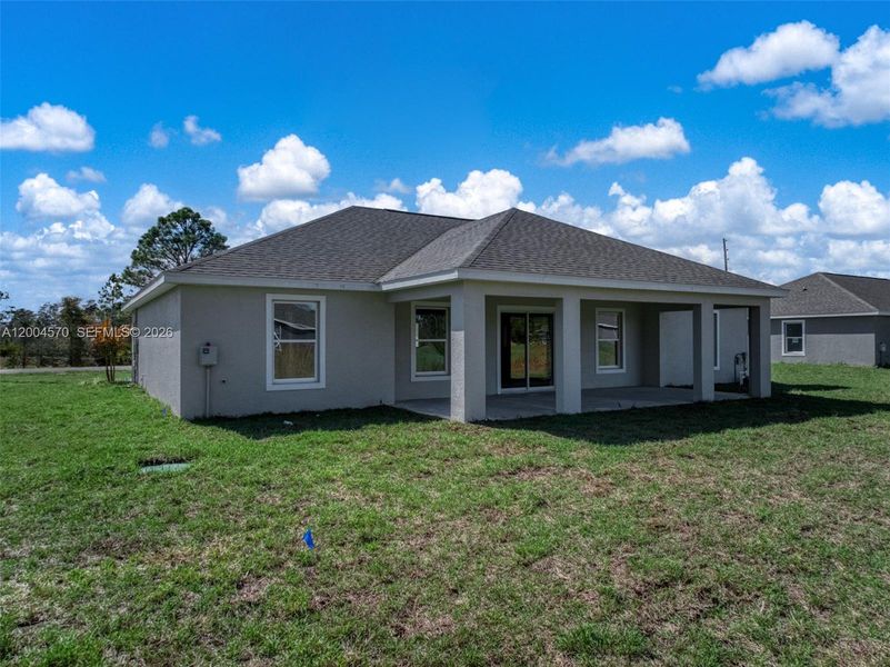 Exterior details and patio area of a home in , Sebring (Image 19).