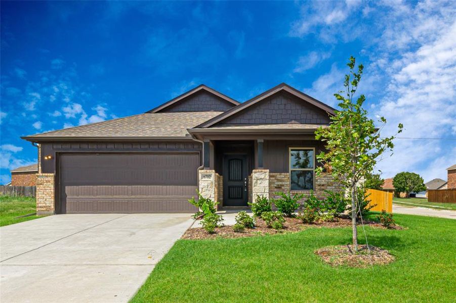 Front exterior of a new home in Bridgepoint, Greenville, TX, highlighting curb appeal (Image 23). Front exterior of a new home in Bridgepoint, Greenville, TX, highlighting curb appeal (Image 23).
