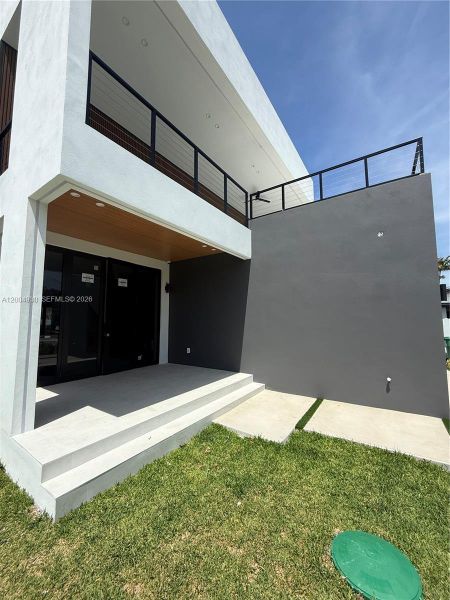 Exterior details and patio area of a home in , Miami (Image 3). Exterior details and patio area of a home in , Miami (Image 3).