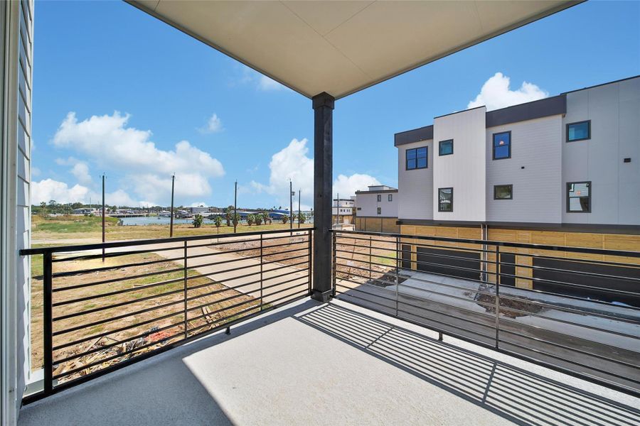 Exterior details and patio area of a home in Lago Pointe, Seabrook (Image 3).