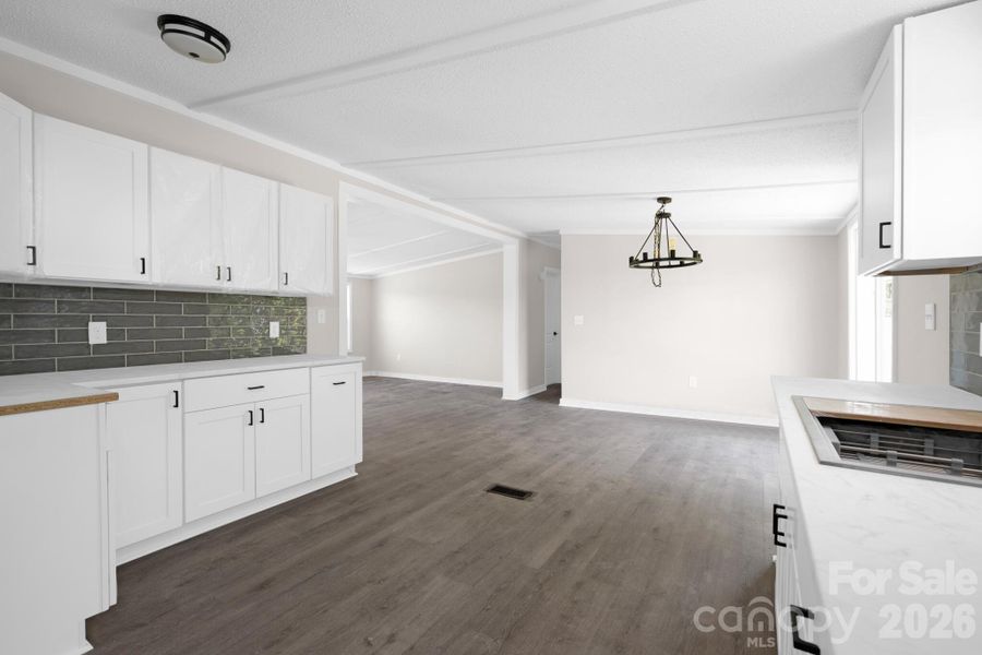 Spacious, unfurnished interior of a new home in , Vale (Image 19).