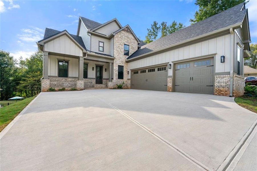 Front exterior of a new home in , Jefferson, GA, highlighting curb appeal (Image 21).