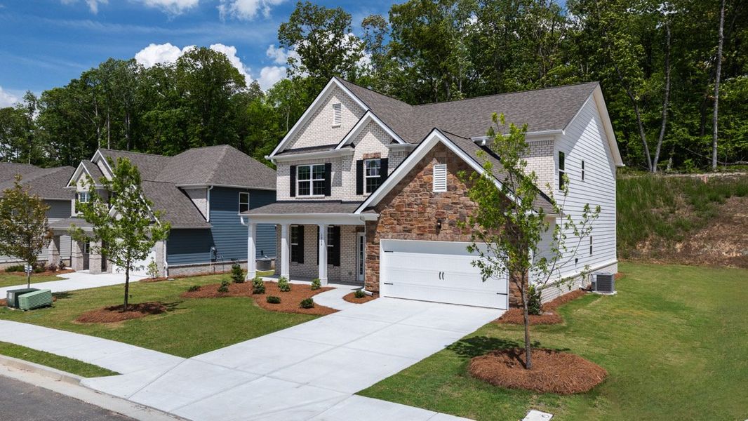 Representative exterior photo of a completed home built from the LYNNBROOK by D.R. Horton in Butner Estates, South Fulton, GA (Image 2).