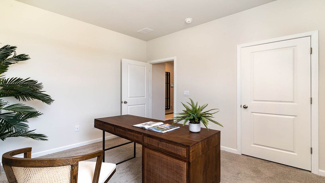 Representative furnished interior of a home built from the ARIA by D.R. Horton in Rich Square at Brunswick Plantation, Ash (Image 8).
