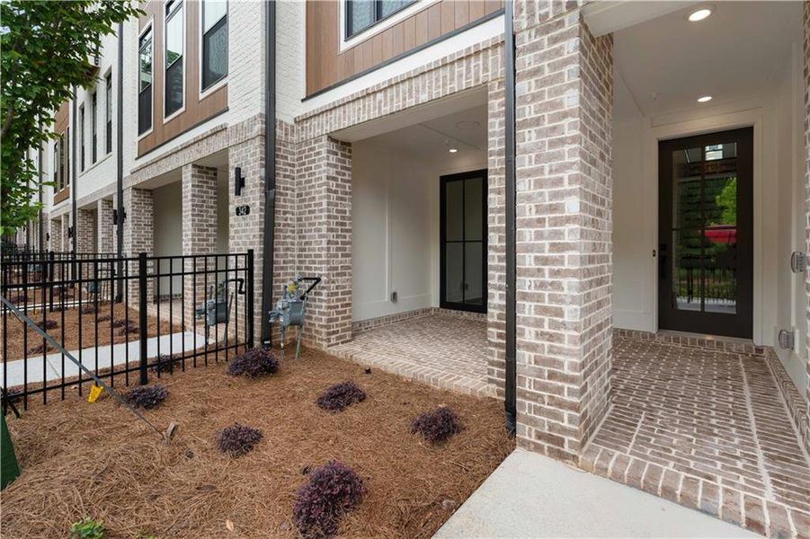 Exterior details and patio area of a home in Ecco Park, Alpharetta (Image 26). Exterior details and patio area of a home in Ecco Park, Alpharetta (Image 26).