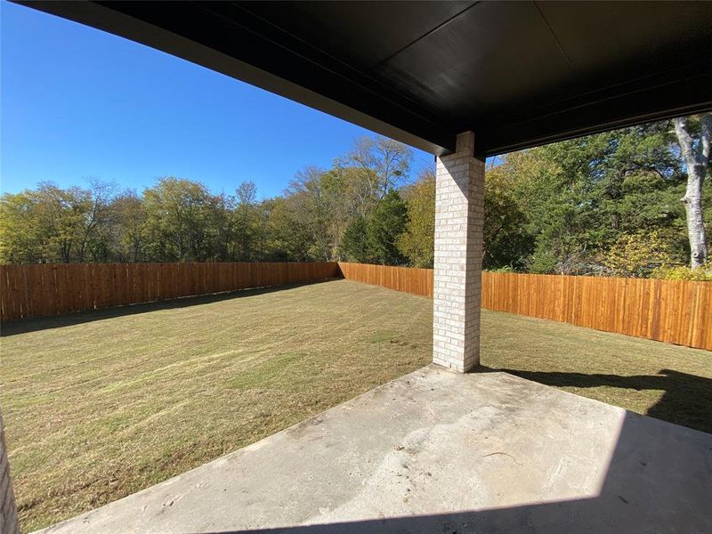 Nice covered back patio with amazing yard & view Nice covered back patio with amazing yard & view