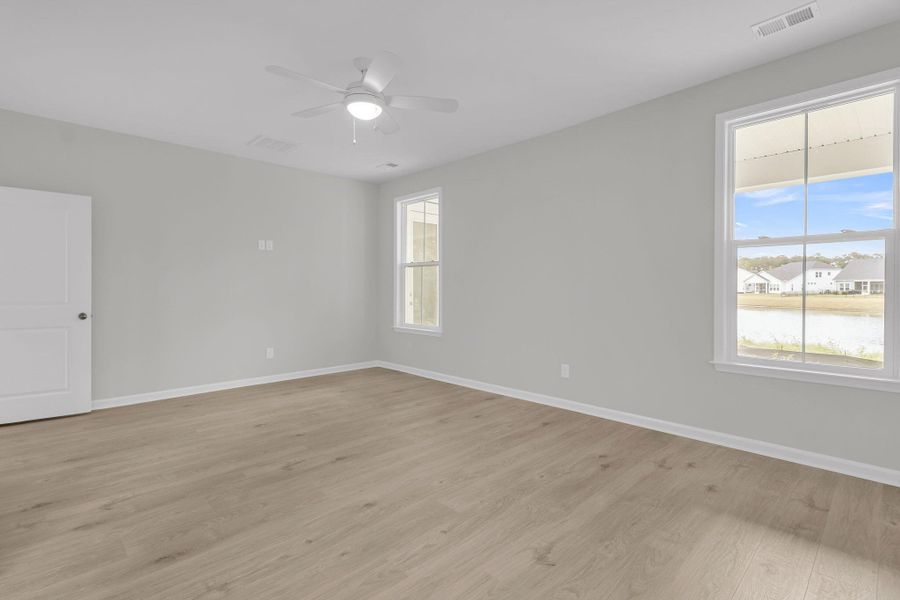 Spacious, unfurnished interior of a new home in Tidewater at Lakes of Cane Bay, Summerville (Image 26). Spacious, unfurnished interior of a new home in Tidewater at Lakes of Cane Bay, Summerville (Image 26).