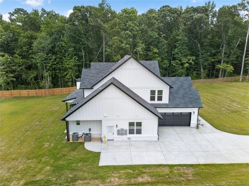 Front exterior of a new home in , Bethlehem, GA, highlighting curb appeal (Image 35).