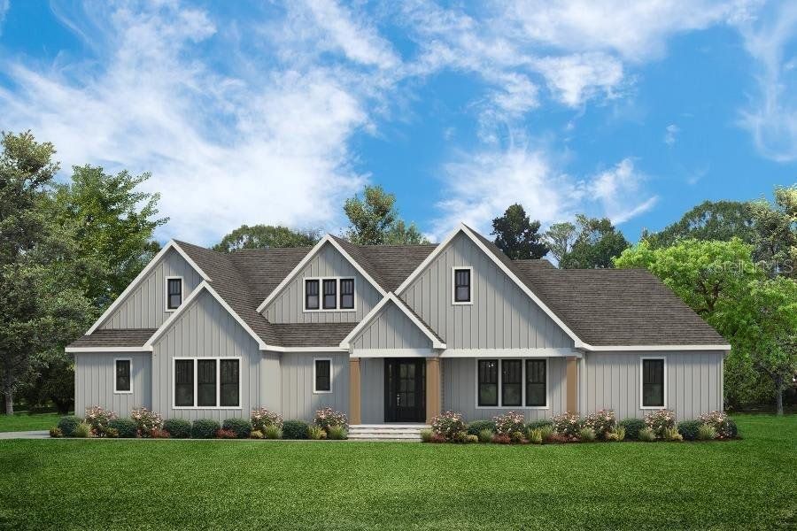 Front exterior of a new home in , Palm Coast, FL, highlighting curb appeal (Image 2). Front exterior of a new home in , Palm Coast, FL, highlighting curb appeal (Image 2).