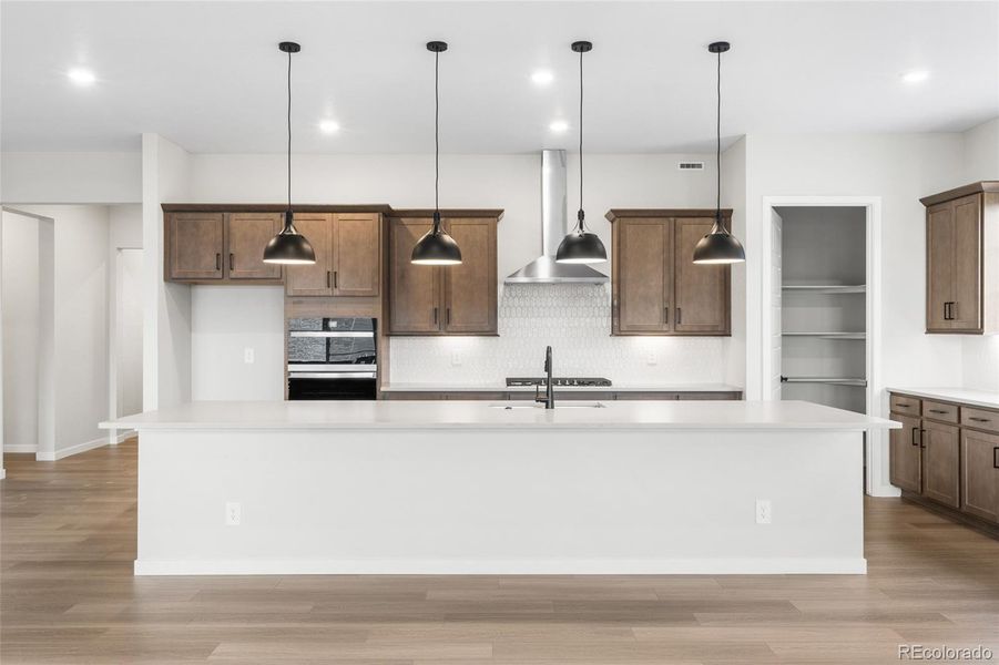 Furnished interior view inside a new home in Hilltop at Inspiration, Aurora (Image 15).