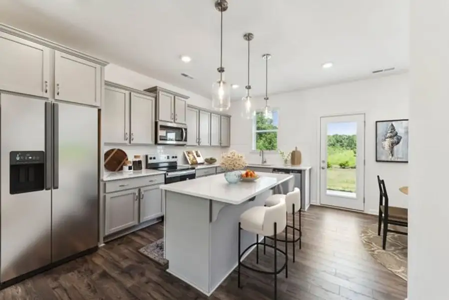 Representative furnished interior of a home built from the Lucas TH by True Homes in Hoover Townhomes, Charlotte (Image 3).
