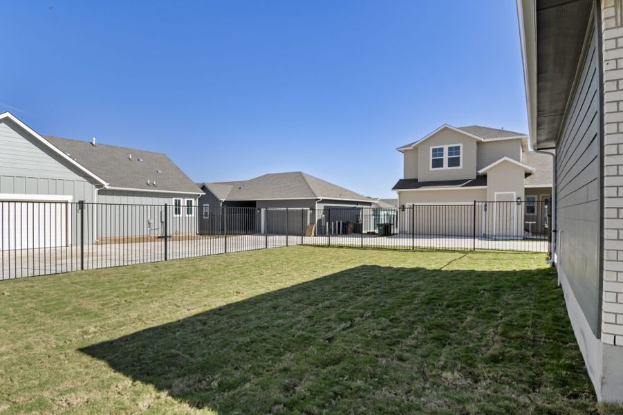 Exterior details and patio area of a home in Easton Park, Austin (Image 34).