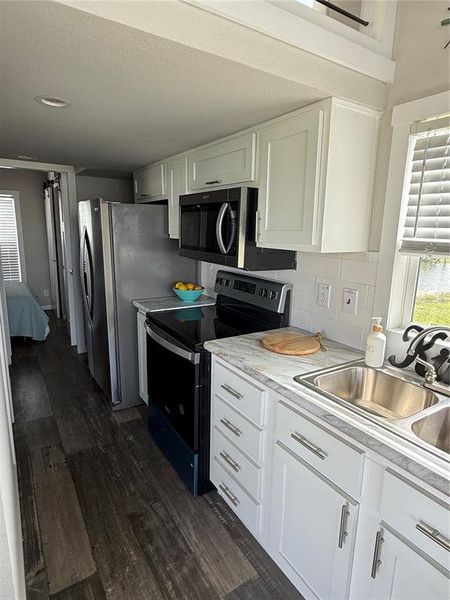 Furnished interior view inside a new home in , Punta Gorda (Image 4).