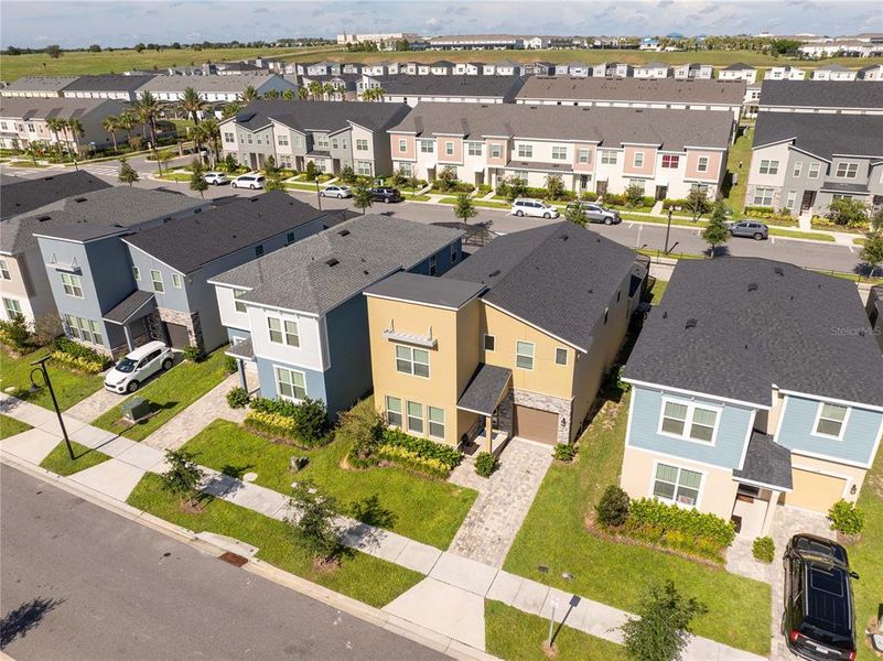 Front exterior of a new home in , Kissimmee, FL, highlighting curb appeal (Image 18).