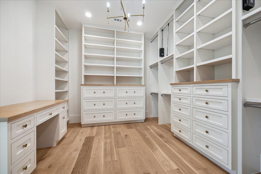 One of the primary walk-in closets. One of the primary walk-in closets.