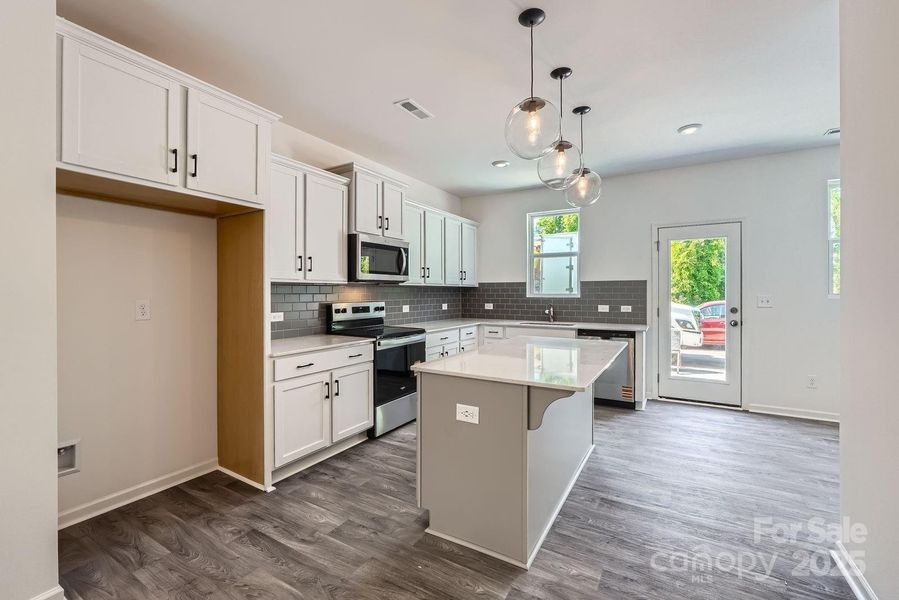 Furnished interior view inside a new home in Dukes Ridge, Charlotte (Image 11).