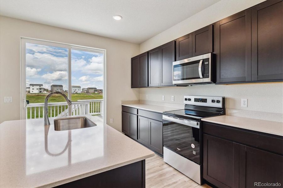 Furnished interior view inside a new home in Spring Valley Ranch, Elizabeth (Image 4).