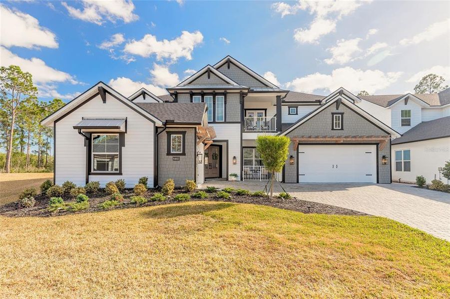 Front exterior of a new home in , Port Orange, FL, highlighting curb appeal (Image 25).