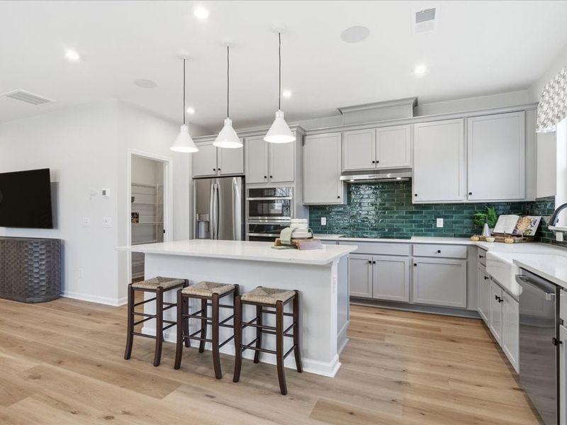 Representative furnished interior of a home built from the Cardinal by Tri Pointe Homes in Ellis Townes, Charlotte (Image 9).