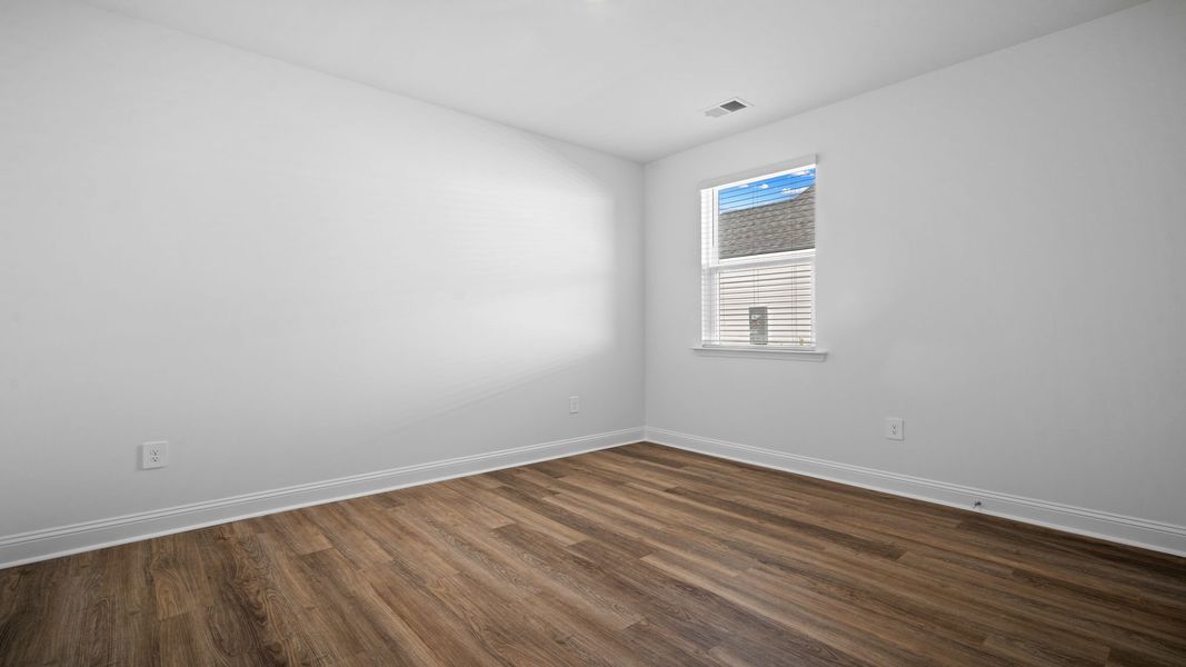 Spacious, unfurnished interior of a new home in The Lakes at North Glynn, Brunswick (Image 23).