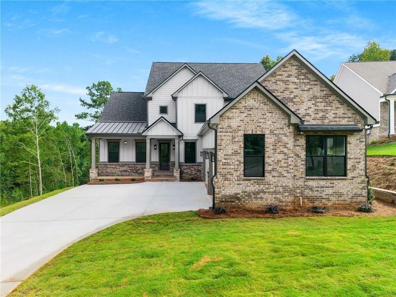 Front exterior of a new home in , Jefferson, GA, highlighting curb appeal (Image 20).