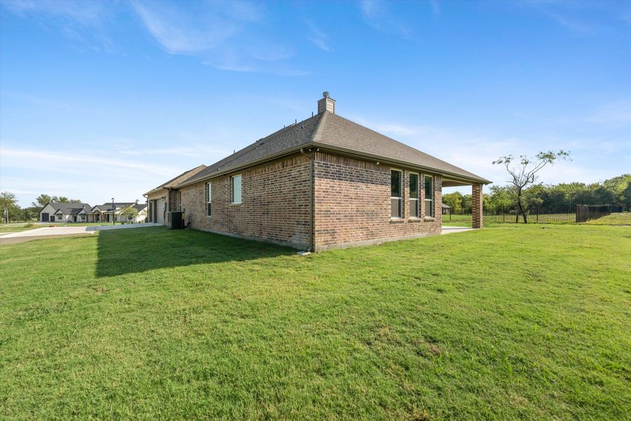 Exterior details and patio area of a home in Vista Oaks Estates, Royse City (Image 22). Exterior details and patio area of a home in Vista Oaks Estates, Royse City (Image 22).