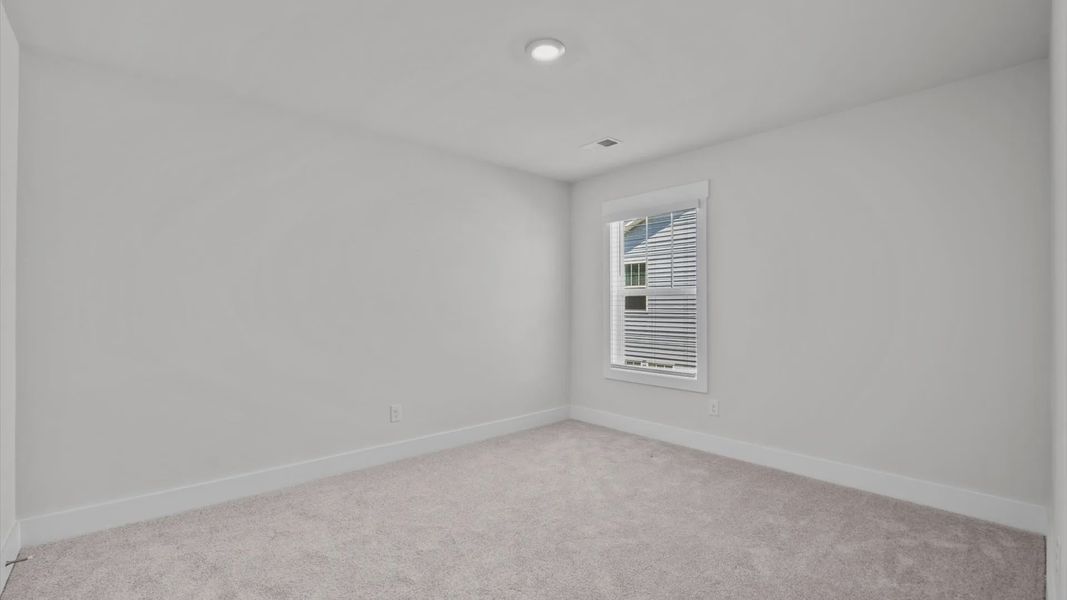 Representative unfurnished interior of a home built from the Jasmine by DRB Homes in Pleasant Falls, Moore (Image 30).