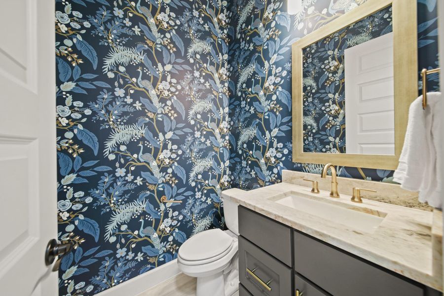 Fun powder room tucked away from living area. Fun powder room tucked away from living area.