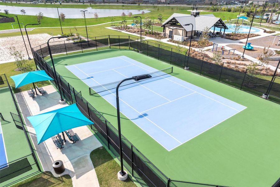 Full-sized tennis courts offering plenty of space to serve, volley, and stay active outdoors.