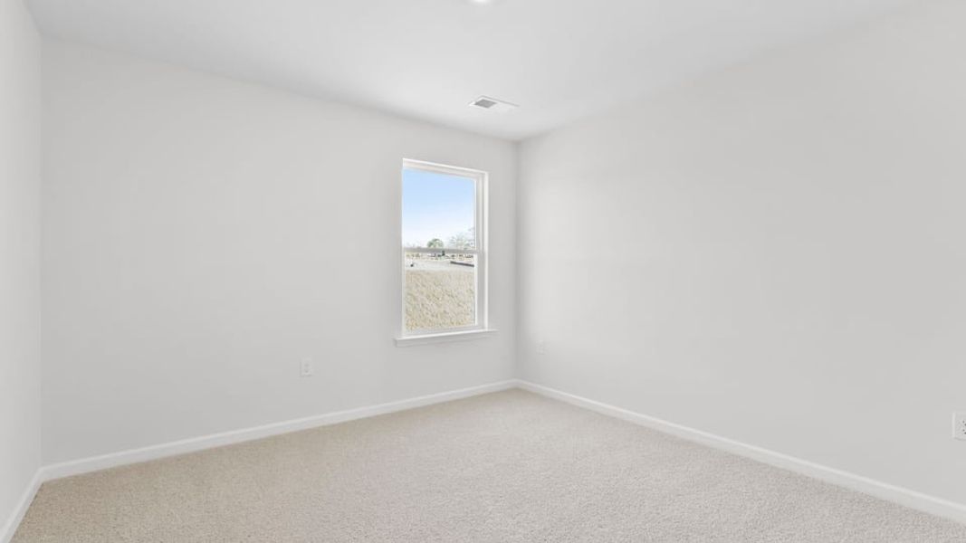 Spacious, unfurnished interior of a new home in Village Grove, Greenville (Image 27).