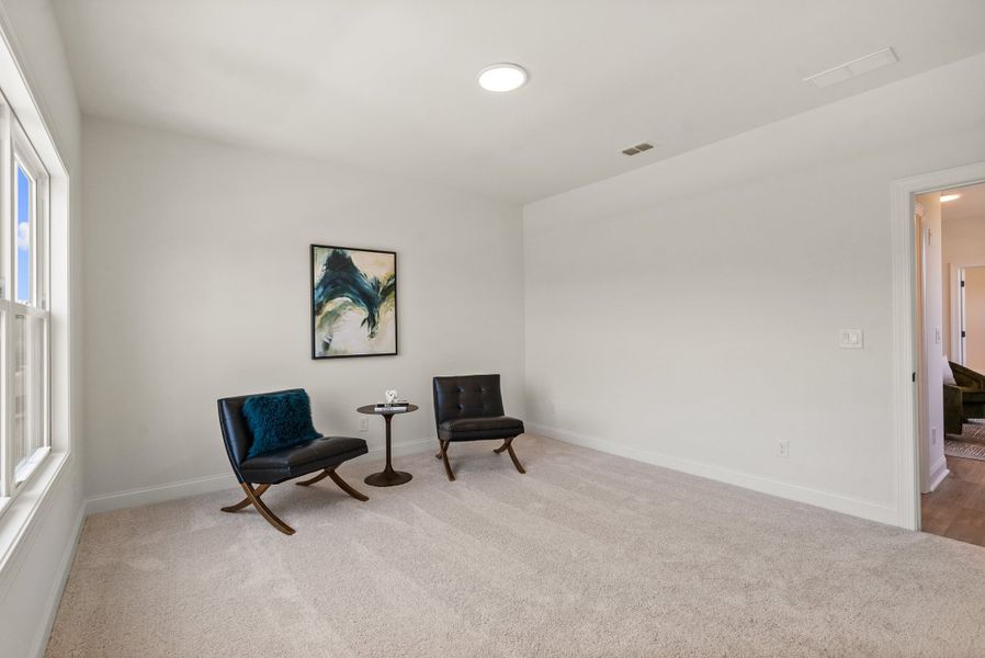 Representative furnished interior of a home built from the The Kenton by The Providence Group in Promenade at Sawnee Village, Cumming (Image 42).