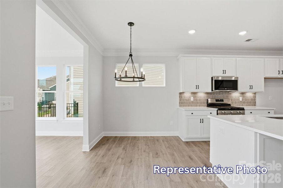 Furnished interior view inside a new home in Enclave at Riverdale, Huntersville (Image 16).
