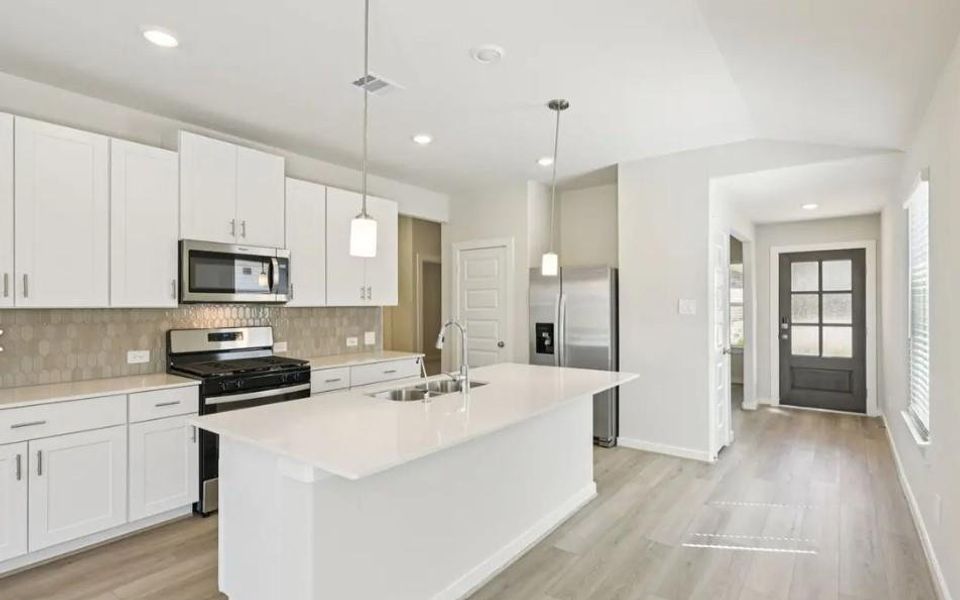 Photo is not of the actual home, but is an inspirational photo of builder’s model home and may depict options, furnishings, and/or decorator features that are not included