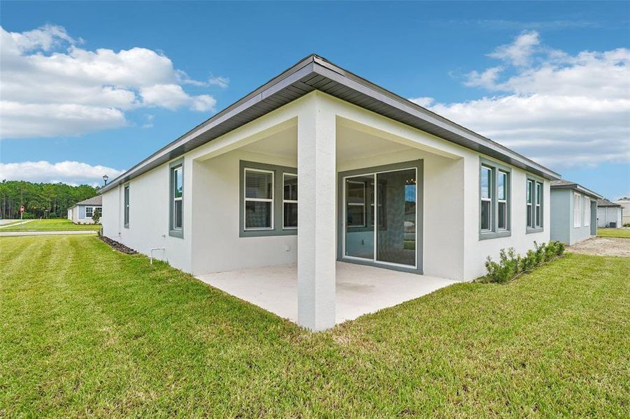 Exterior details and patio area of a home in Legends Preserve - Signature Series, Daytona Beach (Image 25).