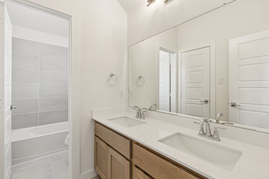 Bathroom in the Da Vinci II home plan by Trophy Signature Homes – REPRESENTATIVE PHOTO
