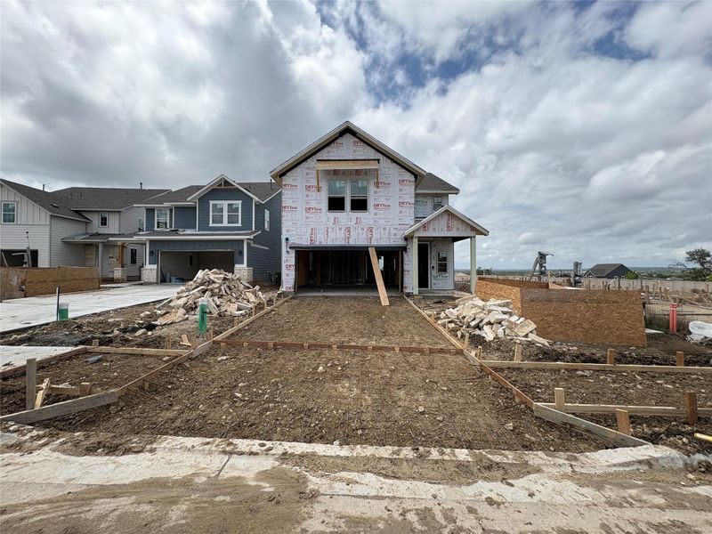 In-progress construction of a new home in Cannon Ranch, Dripping Springs, TX (Image 19).