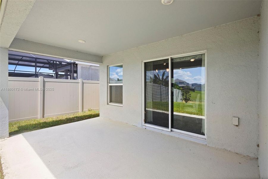 Exterior details and patio area of a home in , Davenport (Image 4).