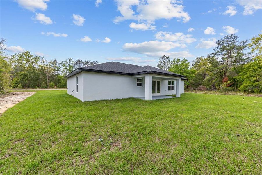Exterior details and patio area of a home in , Ocklawaha (Image 26).