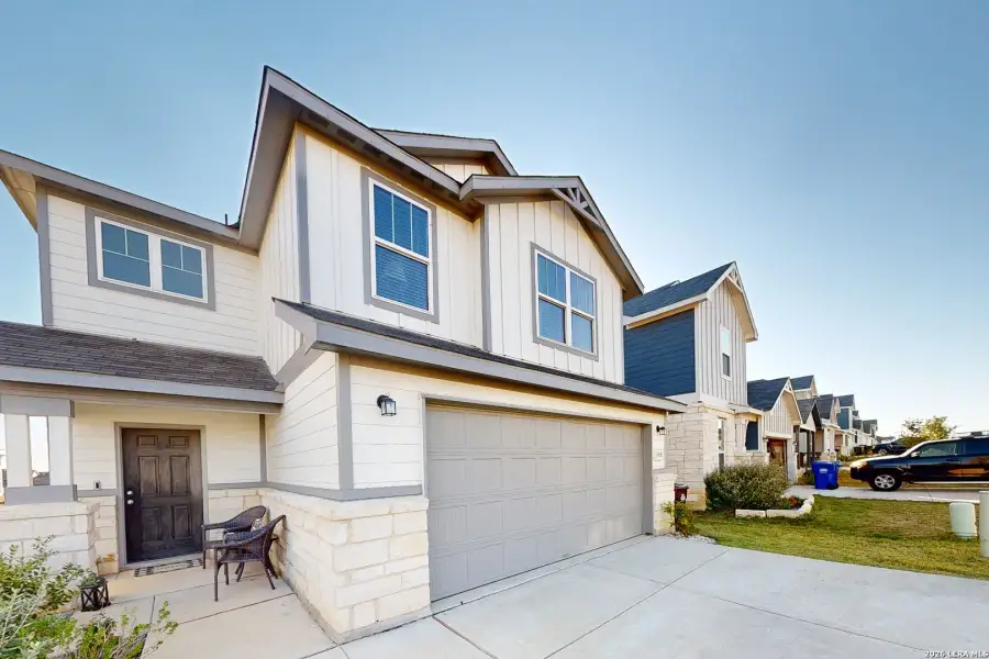 Front exterior of a new home in Horizon Ridge, San Antonio, TX, highlighting curb appeal (Image 2). Front exterior of a new home in Horizon Ridge, San Antonio, TX, highlighting curb appeal (Image 2).