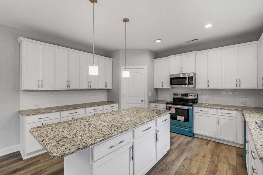 Representative furnished interior of a home built from the Drayton by Caviness & Cates Communities in Bartlett Manor, Youngsville (Image 167).