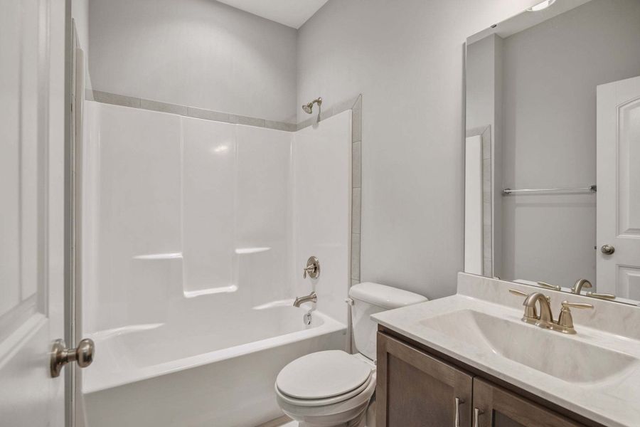 Representative furnished interior of a home built from the Garland by Caviness & Cates Communities in Bartlett Manor, Youngsville (Image 247). Representative furnished interior of a home built from the Garland by Caviness & Cates Communities in Bartlett Manor, Youngsville (Image 247).