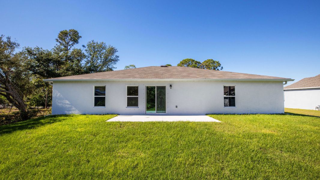 Exterior details and patio area of a home in Port Charlotte, Port Charlotte (Image 3).