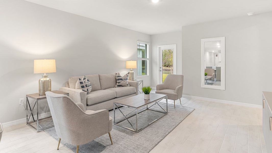 Furnished interior view inside a new home in Coral Bay - Express & Tradition, North Fort Myers (Image 5).