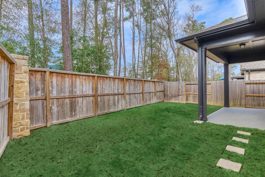 Exterior details and patio area of a home in The Highlands - Grove Collection, Porter (Image 3).